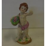 Continental figure of a boy 12cm high approx
