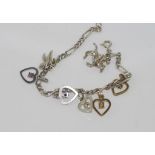 Silver charm bracelet with 9ct charms (including M and hearts) and a silver horse