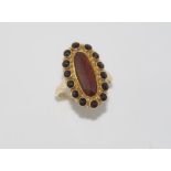 Vintage 14ct yellow gold and garnet ring large centre garnet 16mm x 6mm, surrounded by 14 smaller