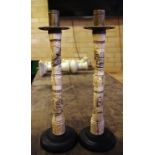 Two Asian brass & carved bone candlesticks mounted on wooden bases, 32cm high approx
