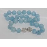 Aquamarine bead necklace with ornate silver clasp, 55.5cm long approx