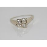 18ct white gold, 4 diamond ring weight: approx 3.6 grams, size: approx M/6, ring has split and needs