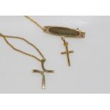 9ct yellow cross with diamond on plated chain together with a 9ct gold brooch with cross, total