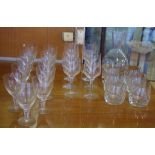 Eleven Orrefors wine glasses, 8 others, a carafe and 6 Bohemian crystal tumblers