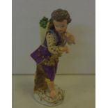 German figure carrying grapes 13cm high.