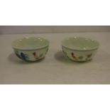Two Chinese doucai porcelain tea bowls with chicken and floral decoration, reign mark to base, 8cm