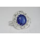 18ct white gold, sapphire and diamond ring sapphire 2.99 cts (treated), weight: approx 3.8 grams,