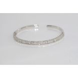18ct white gold and tapered diamond bracelet /cuff 168 tapered diamonds = 1.29cts, weight: approx