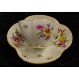 Meissen hand painted coffee cup & saucer decorated with floral sprigs, saucer with chip