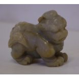 Chinese carved green stone figurine 6.5cm wide approx
