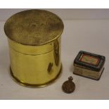 Trench art double shell lidded pot dated 1916, together with a AIF military badge,and a Ridgeways