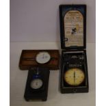 Three early pressure gauges including a Deumo Hand Tachometer