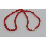 Good red coral (6mm) bead necklace with 9ct yellow gold clasp, 49cm long approx