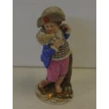 German figure of man & sheep 12.5cm high, restoration to hat and base.