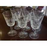 Six Waterford crystal red wine goblets 'Lismore' pattern, small chip to one rim