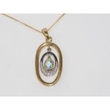 9ct yellow gold and white gold aquamarine pendant with chain, weight: approx 3.3 grams