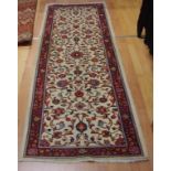 Fine Saruk (Central Iran) woollen rug floral pattern in cream & red, 215cm x 79cm approx.