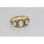 9ct yellow gold, opal and seed pearl ring weight: approx 3.2grams, size: N-O/7
