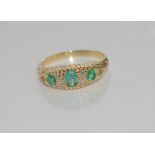 9ct yellow gold, emerald and diamond ring weight: approx 2 grams, size: O/7