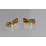 Delicate 9ct gold, pearl and diamond earrings weight: approx 2.3 grams