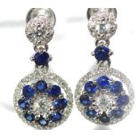 18ct white gold, sapphire and diamond earrings 86 diamonds = 49pts, 18 sapphire = 91pts, weight: 3.9