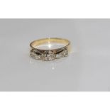 9ct yellow gold and diamond 'bow' ring weight approx 2.86 grams, size: N/6-7