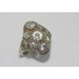 Art Deco 18ct white gold & 9 stone diamond ring centre stone 0.65ct, Total diamond weight 2.46ct.