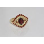 9ct yellow gold, garnet and diamond ring weight: approx 3.1 grams, size: N-O/7