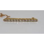 14ct two tone gold and 11 diamond bar brooch weight: approx 5.2 grams, size: approx 5cm width