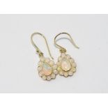 9ct yellow gold and opal drop earrings weight: approx 2.2 grams,