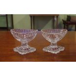 Two Georgian cut crystal salts with lemon squeezer base, 7cm high approx