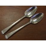 Pair of George lll sterling silver serving spoons hallmarked London 1809, 124g approx., 23cm long