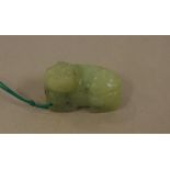 Oriental green jade animal 3 cm high, 4.5 cm long