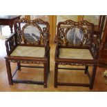 Pair of Chinese rosewood armchairs with marble seats, backs and shell inlay, 62cm wide, 48cm deep,