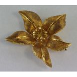 Gold flower brooch stamped ITALY K18, total weight 20gms, pin is steel.