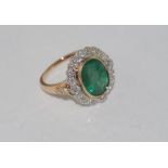 18ct gold, emerald (5.85ct) and diamond ring includes rose and white gold with 24 diamonds = 0.617