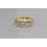 Antique style 18ct yellow gold & diamond ring set with 9 diamonds, with a total weight of 1ct, the