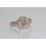 White gold ring with 1.25ct centre diamond natural round old cut L-M/SI1, 12 round 8 cut diamonds