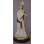 Naples porcelain lady figurine signed B. Merli to base, on timber stand, H32cm approx