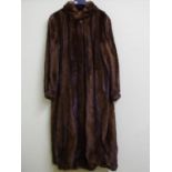 Good vintage Cornelius long mink coat with stand up collar and hook fastening, labelled 'A Cornelius