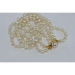 Double strand pearl necklace with mabe pearl clasp