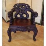 Vintage Chinese armchair ornately carved with dragon back, 72cm wide, 84cm high