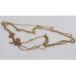 15ct yellow gold and yellow gem necklace weight: approx 15.1 grams, size: approx 152cm length,