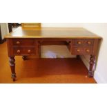 Victorian cedar desk with insert writing surface and turned legs, 144cm wide, 91cm deep, 75cm high