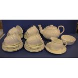 Part Wedgwood ' Countryware' teaset comprising of teapot ,side plate and 8 trios, together with