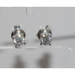 18ct white gold and diamond studs 6 claw set TDW=0.65cts H/Si2, weight: approx 1.65 grams