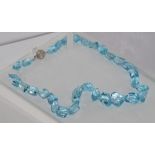 Blue facetted topaz necklace with 9ct gold clasp total approx 470ct. size: approx 52cm