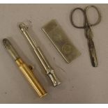 9ct gold cased cigar cutter, in bullet form initialed and dated 1912, together with tow other