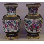 Pair of early large Chinese porcelain vases decorated with figural scene and foo dog handles to each