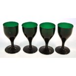 Four Georgian Bristol green stemmed glasses 12cm high approx